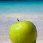 [apple on beach image]