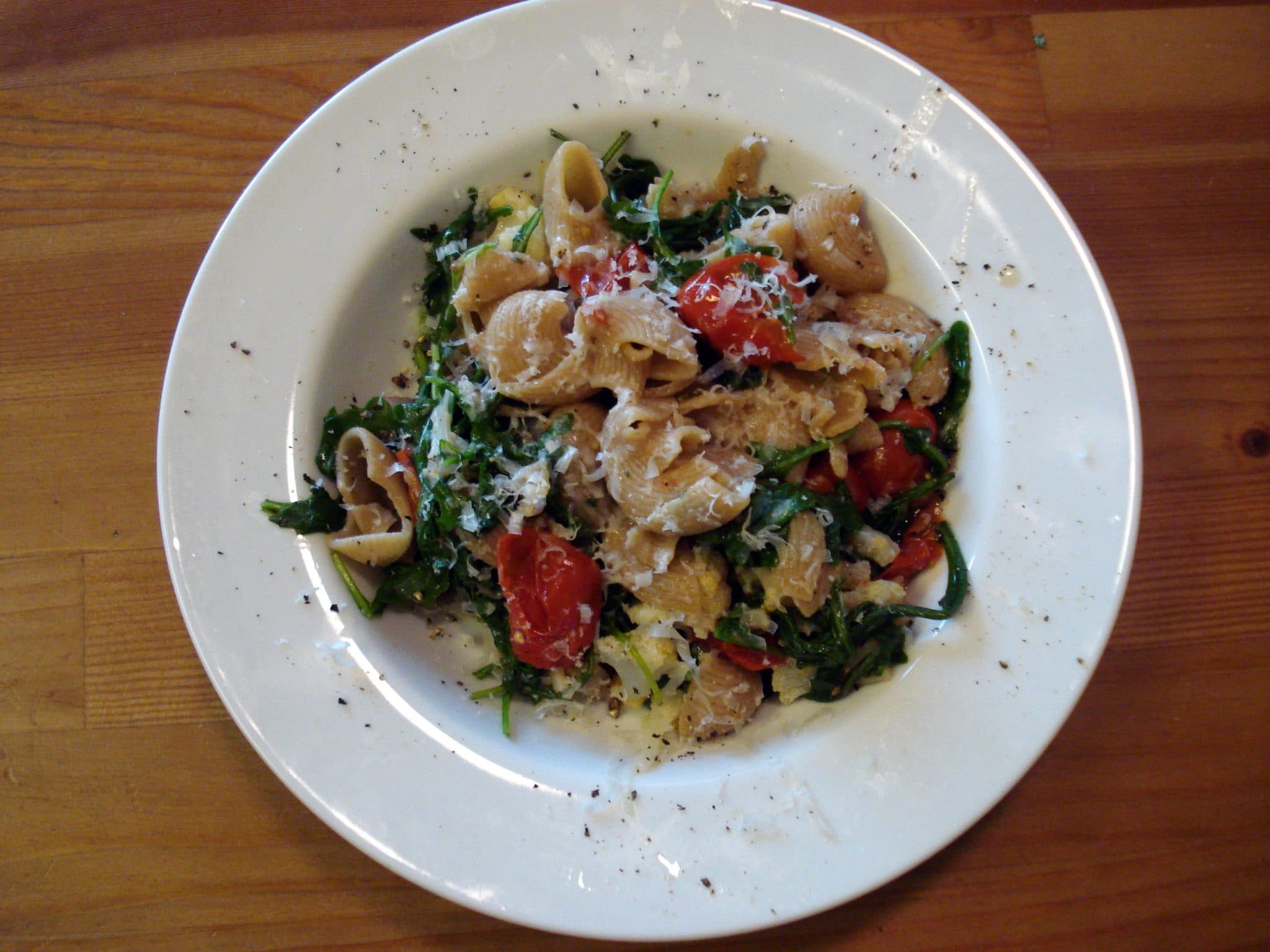 Overhead image of plate of Pasta with Roasted Cauliflower and Arugula