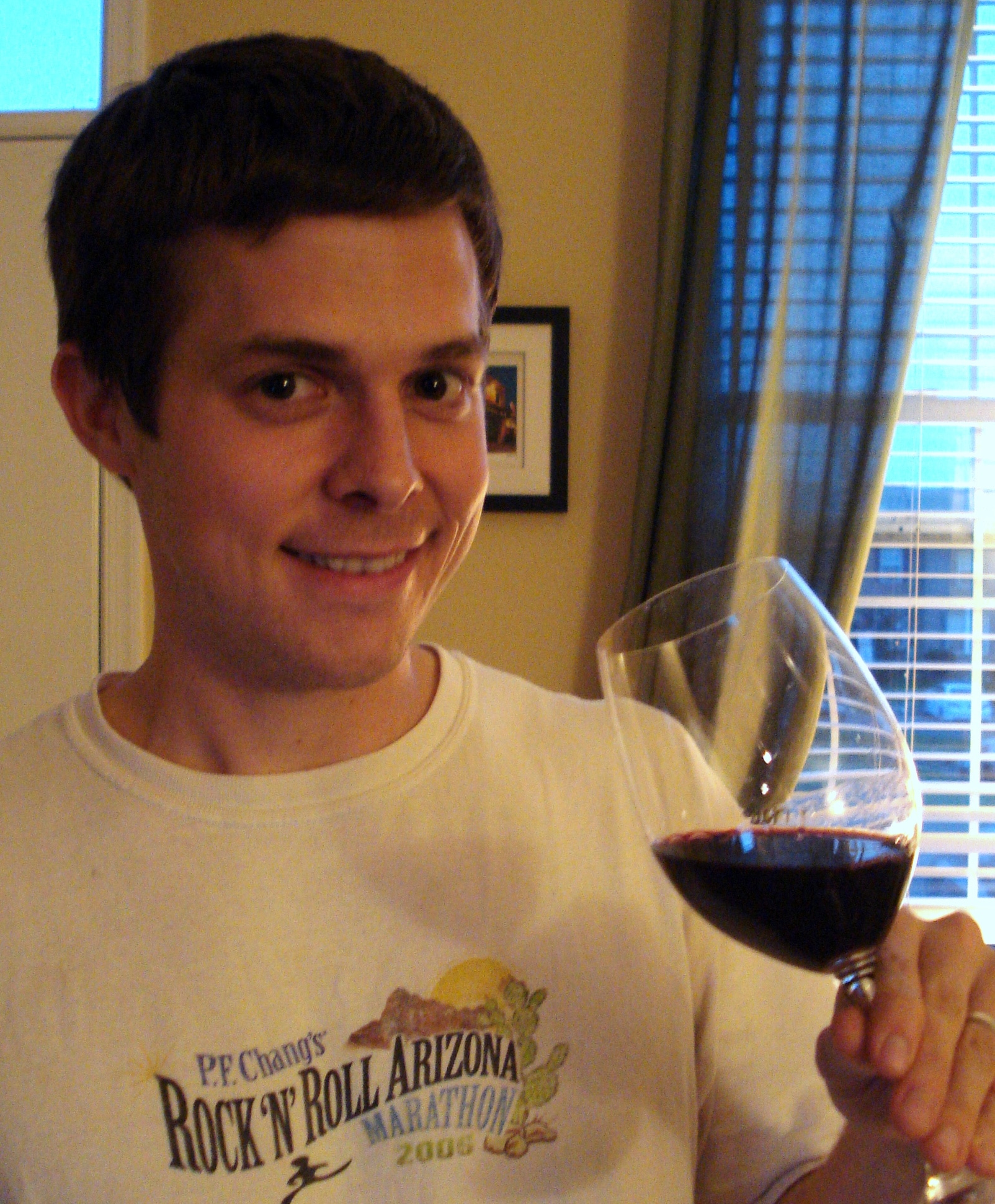 Matt drinking red wine from wine glass