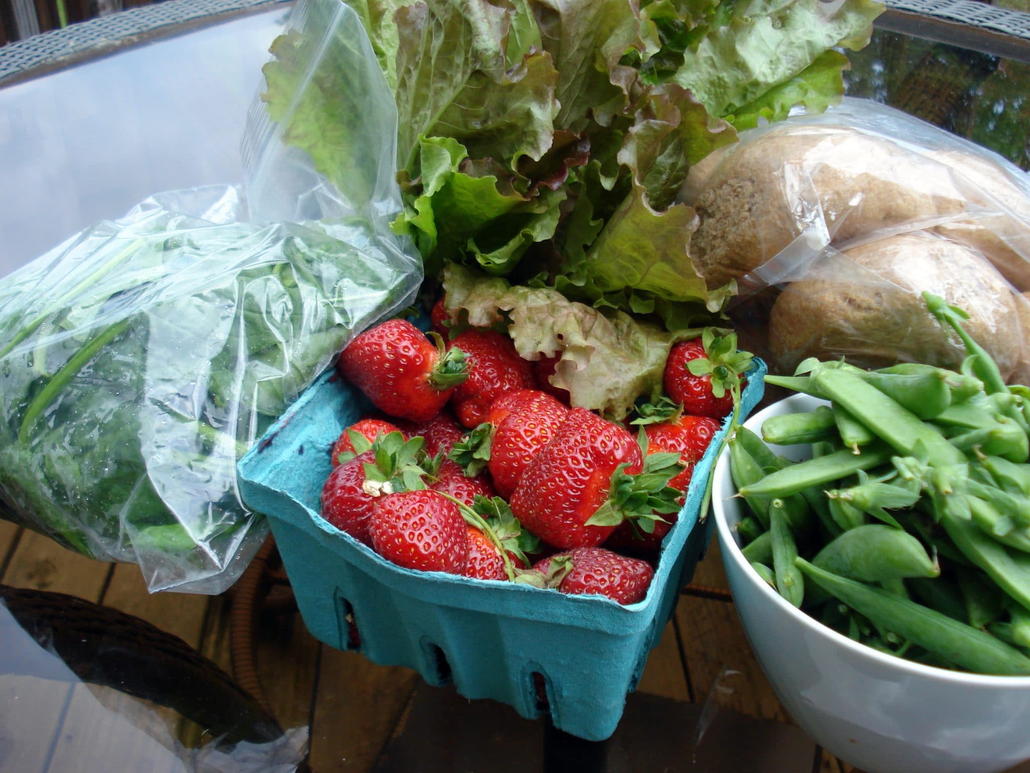 Fresh produce on a glass table from Farmer's Market