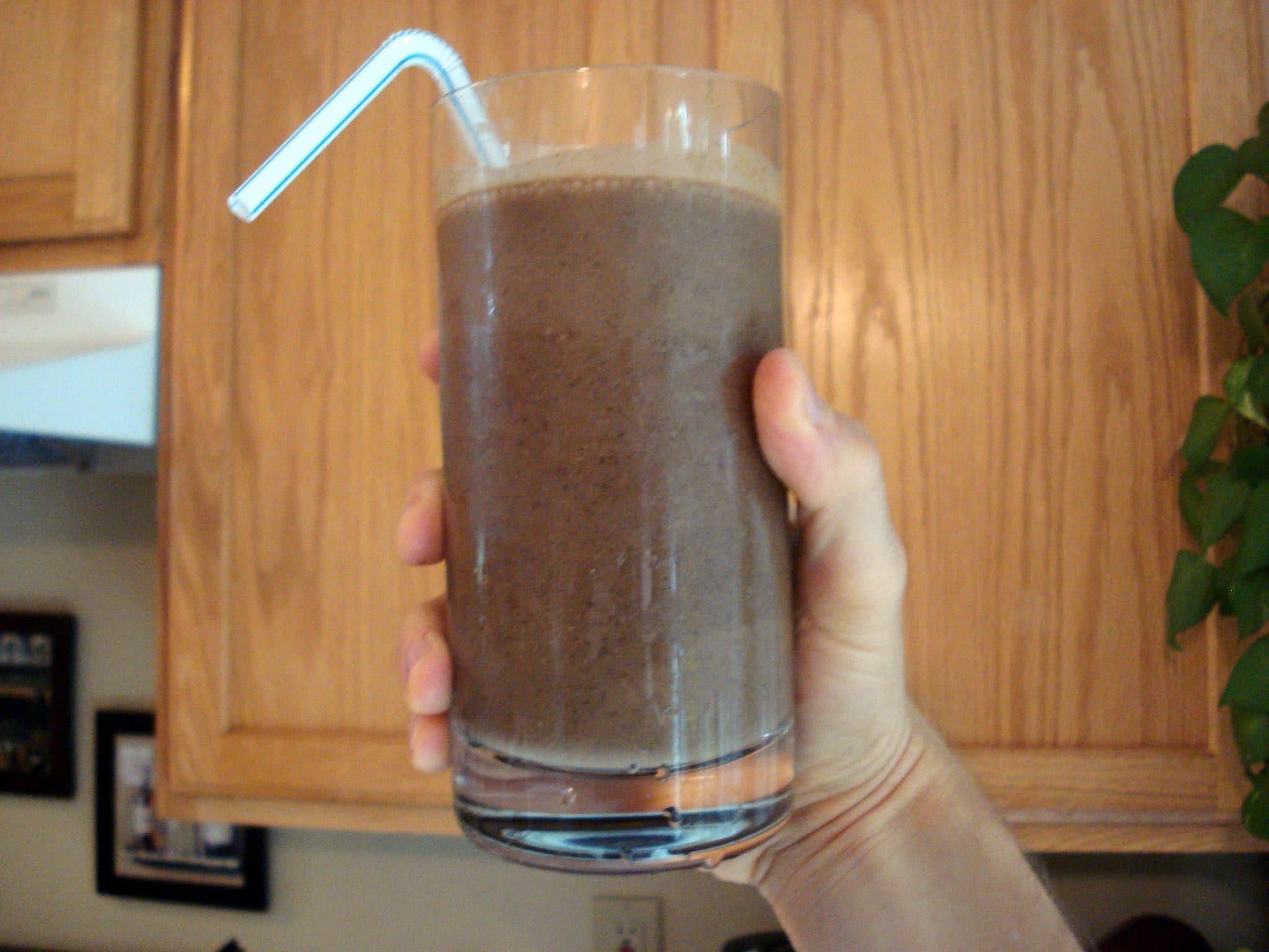 Glass of Amazing Meal Chocolate Smoothie with straw