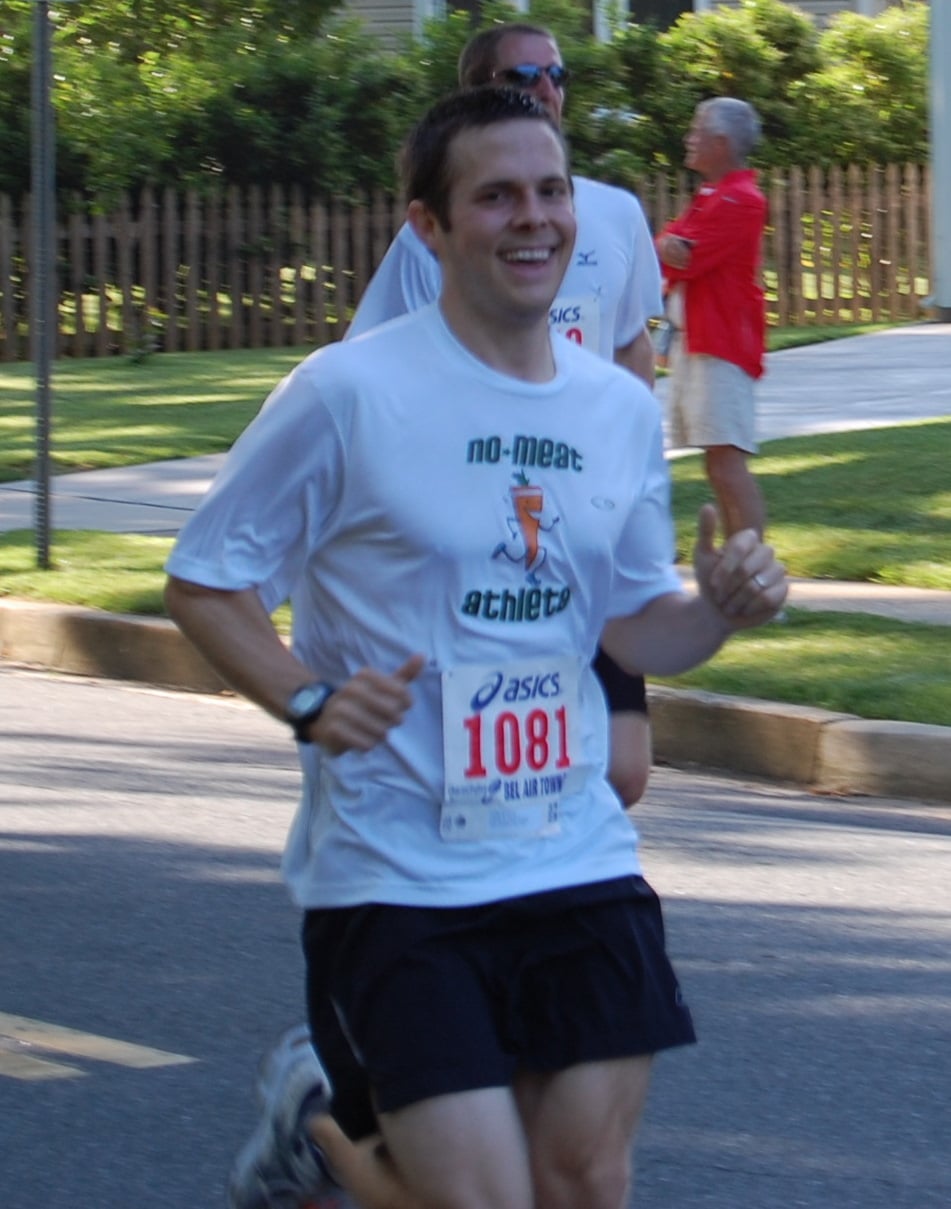 Matt running in white No Meat Athlete t-shirt