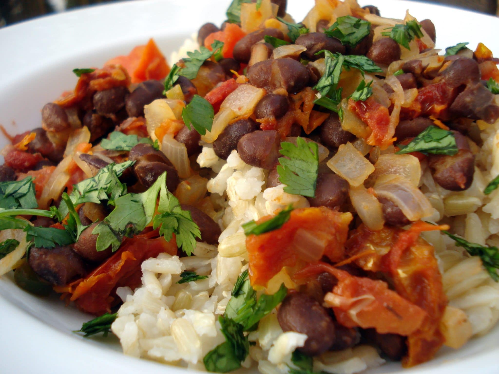 Spicy Black Beans over rise with fresh cilantro