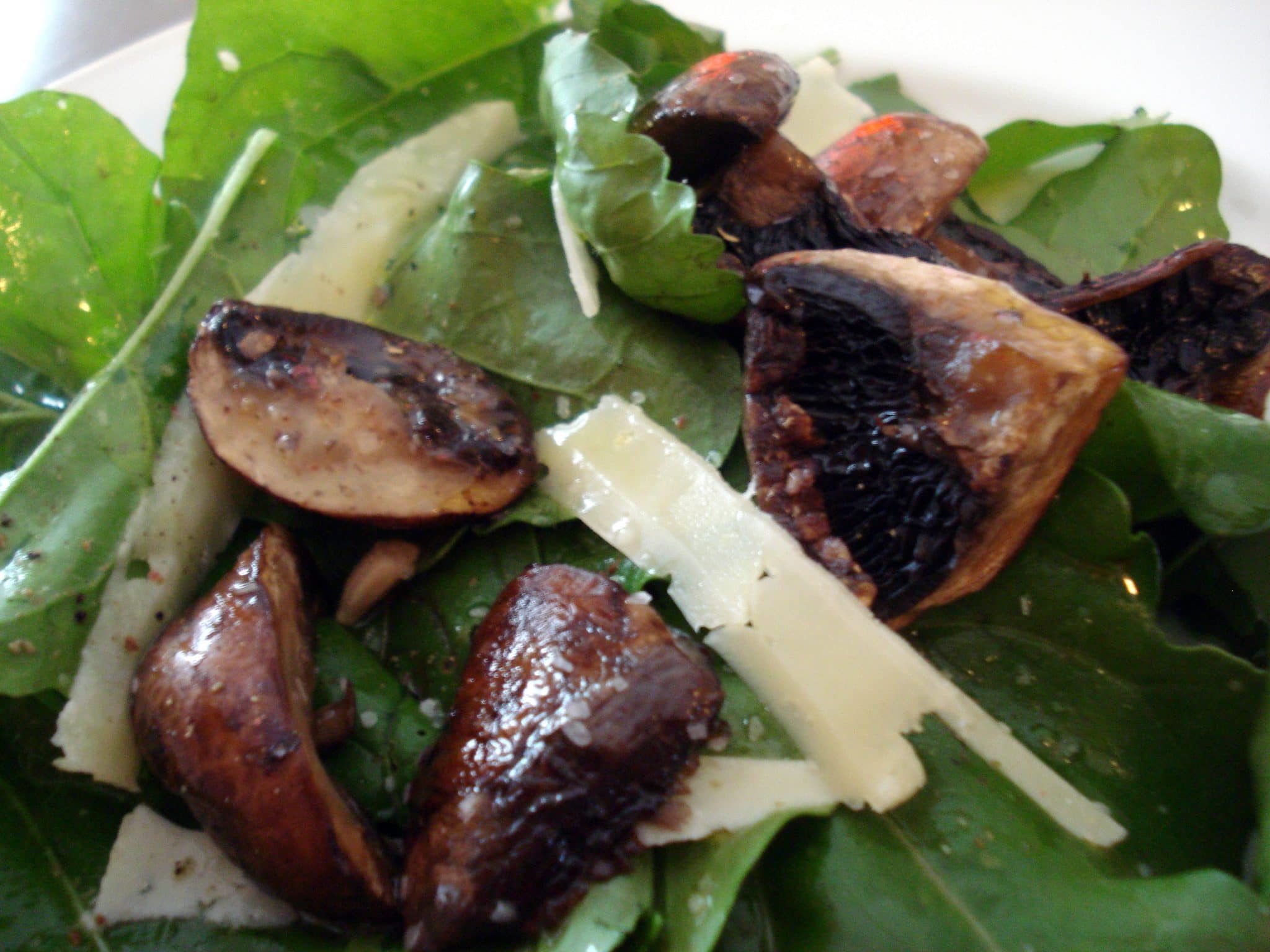 Salad closeup; mushrooms and baby spinach