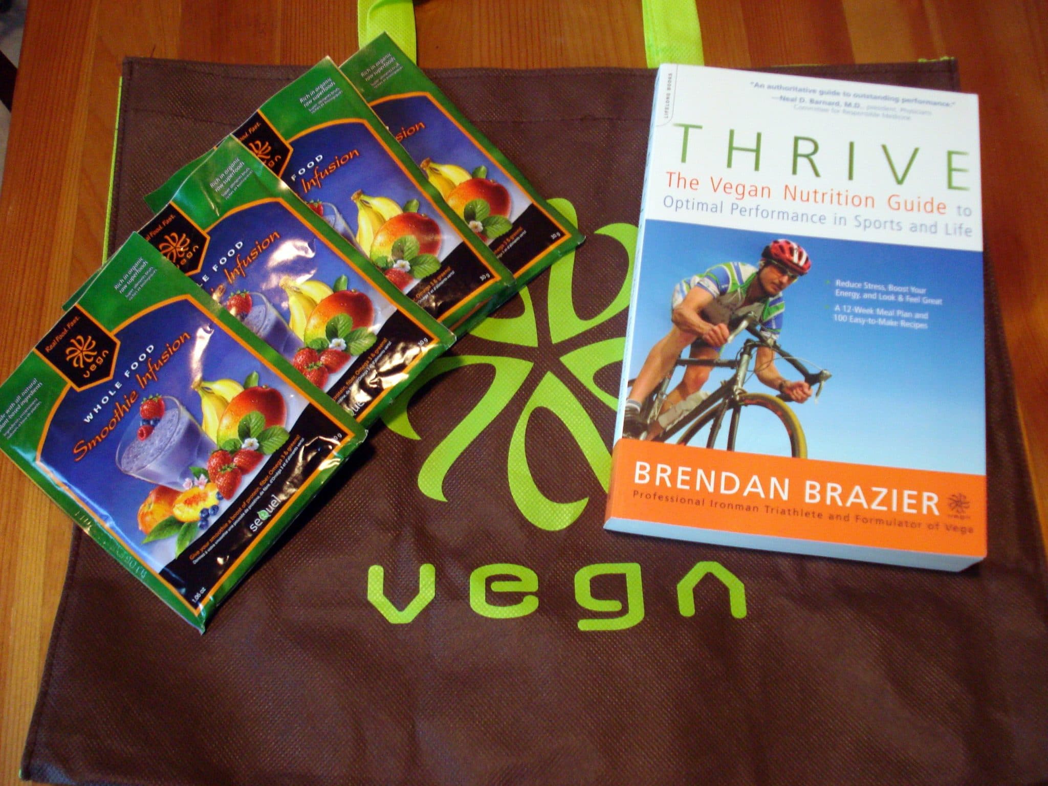 Vega tote with smoothie infusion packets, and Thrive Book.