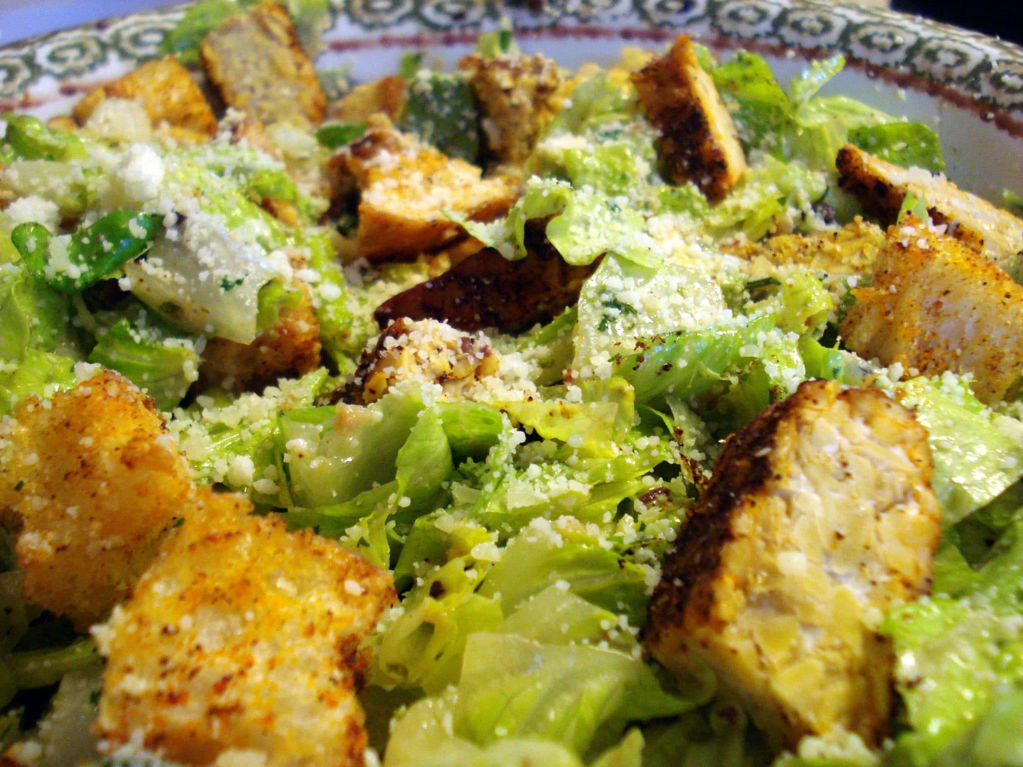 Vegan Southwest Caesar Salad with Grilled Tempeh that resembles croutons