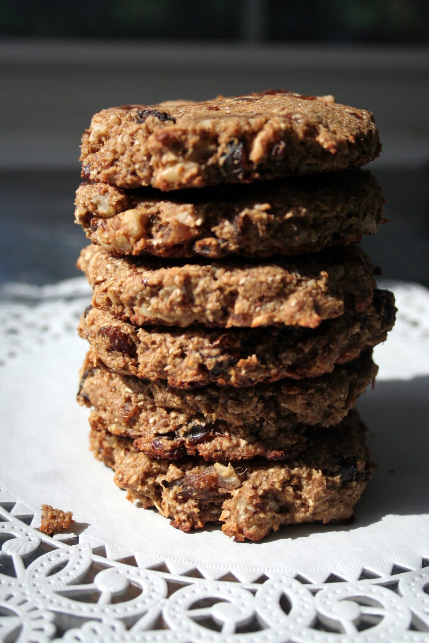 Close up of Vegan Oatmeal Raisin Cookies on a plate