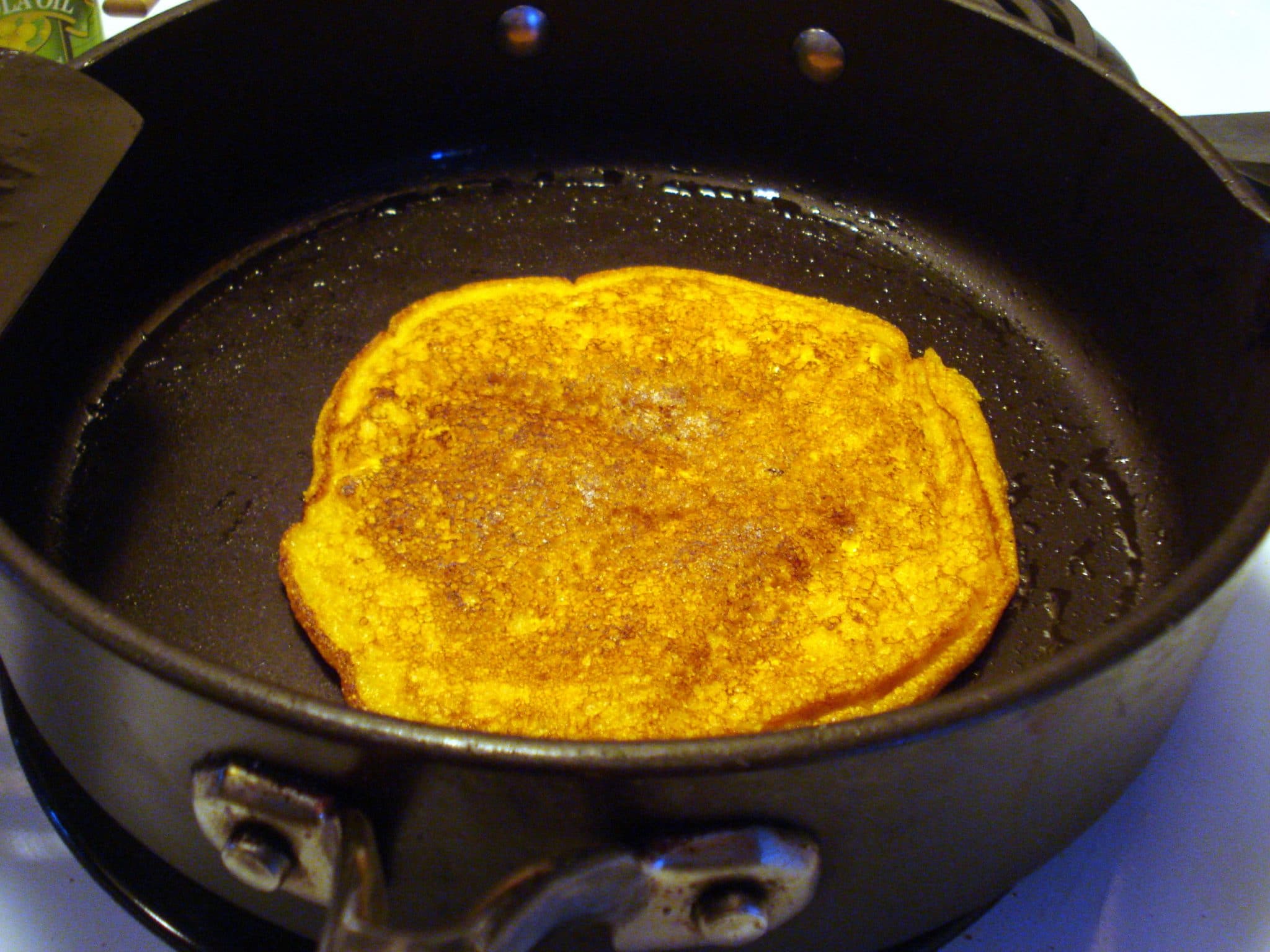 Corn cake in frying pan