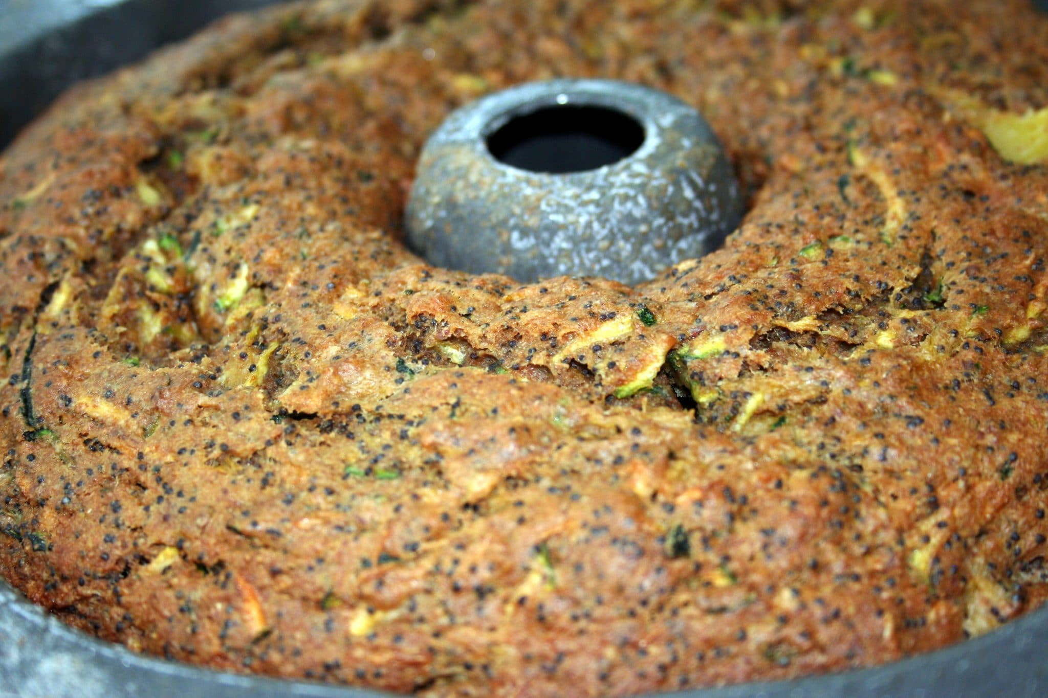 Close up of Lemon Poppy Zucchini Bread in bundt pan