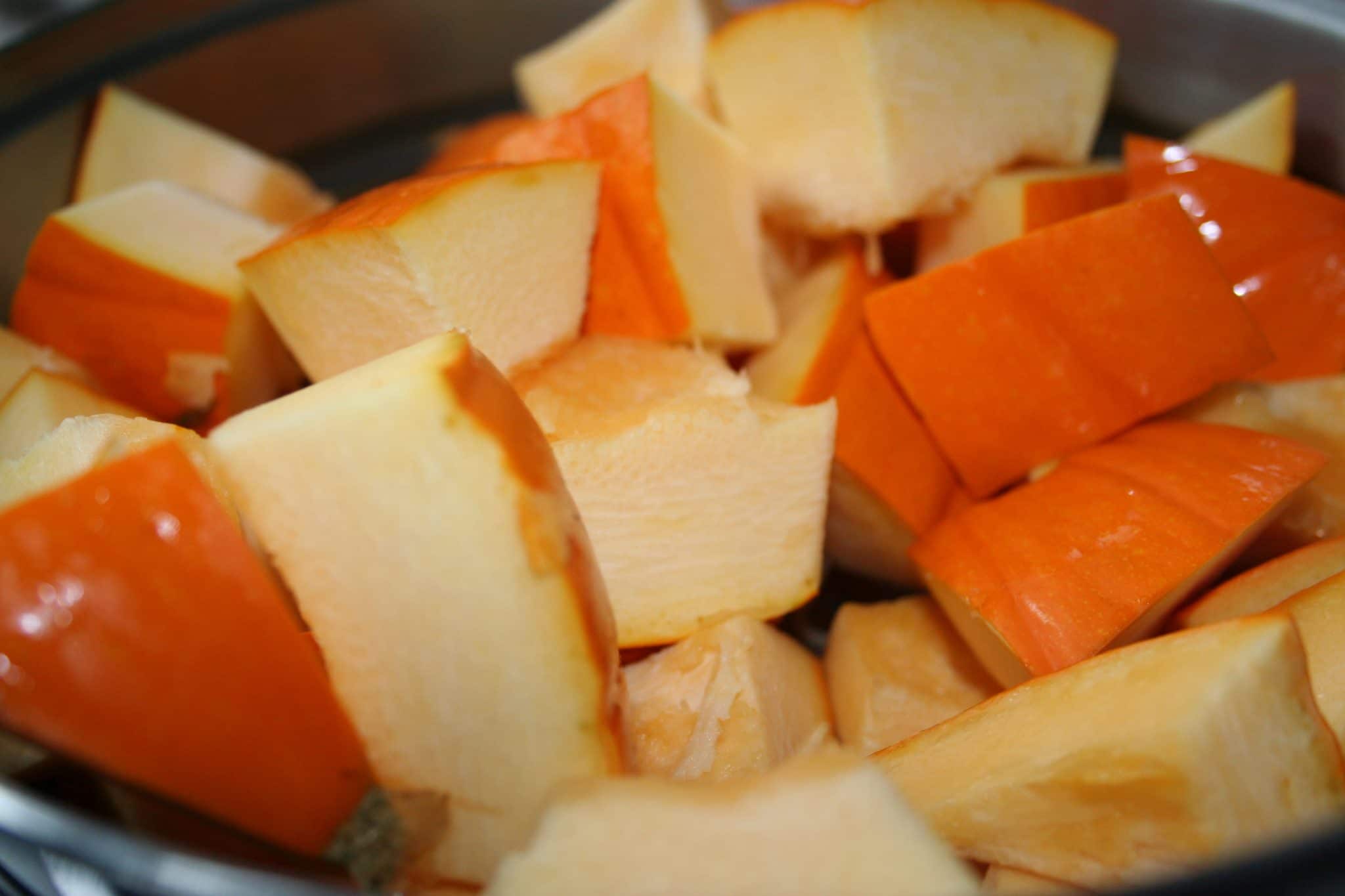 Pumpkin cut into cubes in a bowl