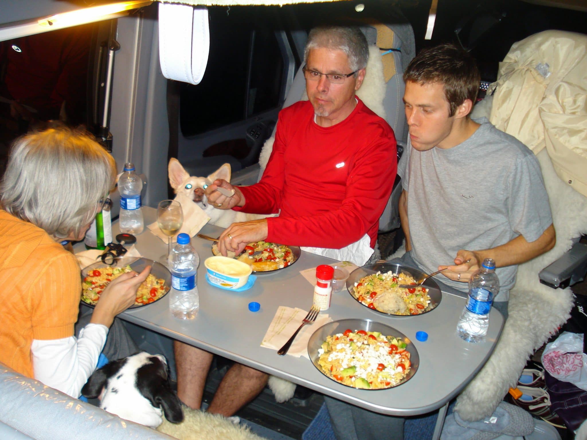 Matt and family eating dinner in RV