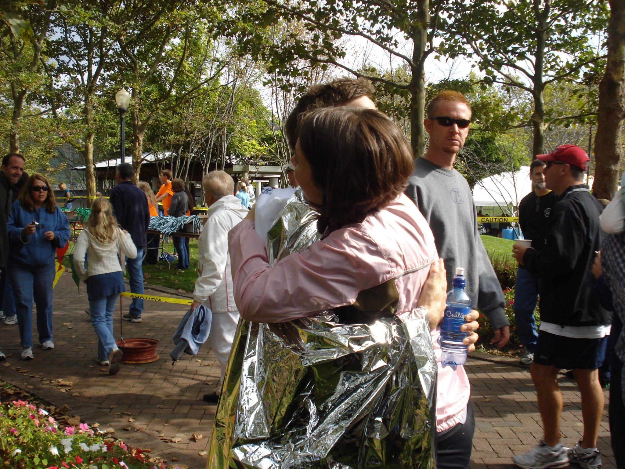 Matt hugging wife to celebrate qualifying for Boston