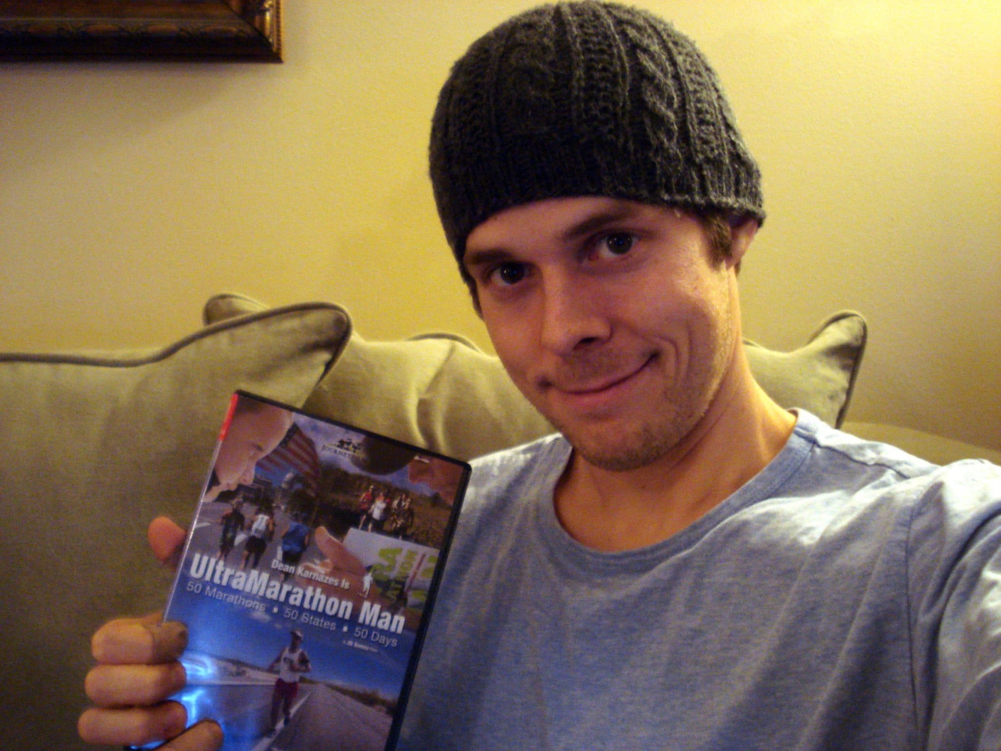 Matt posing with DVD "Ultramarathon Man"