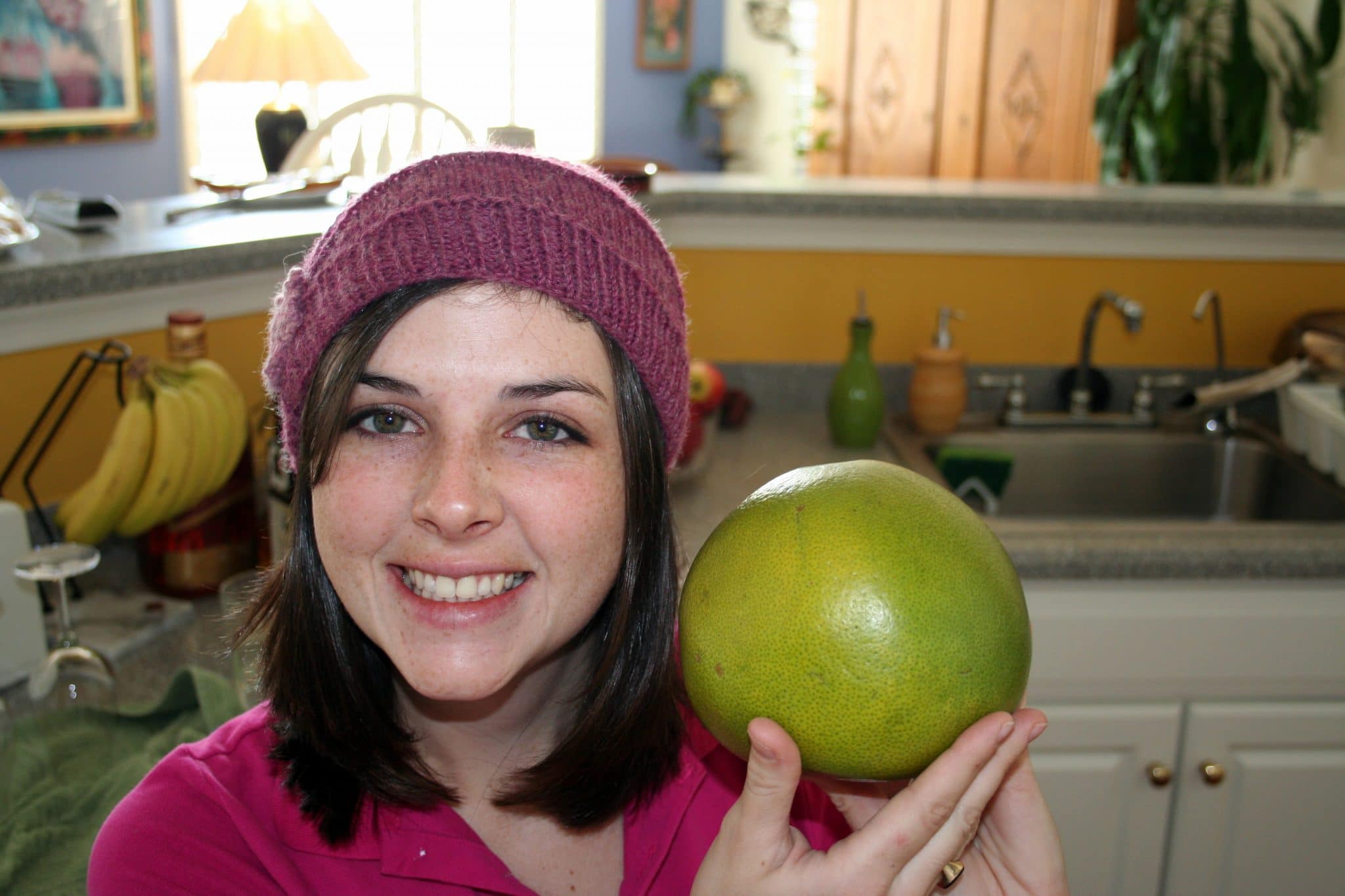 Picture pomelo next to women's head to see it is almost as large as women's head.