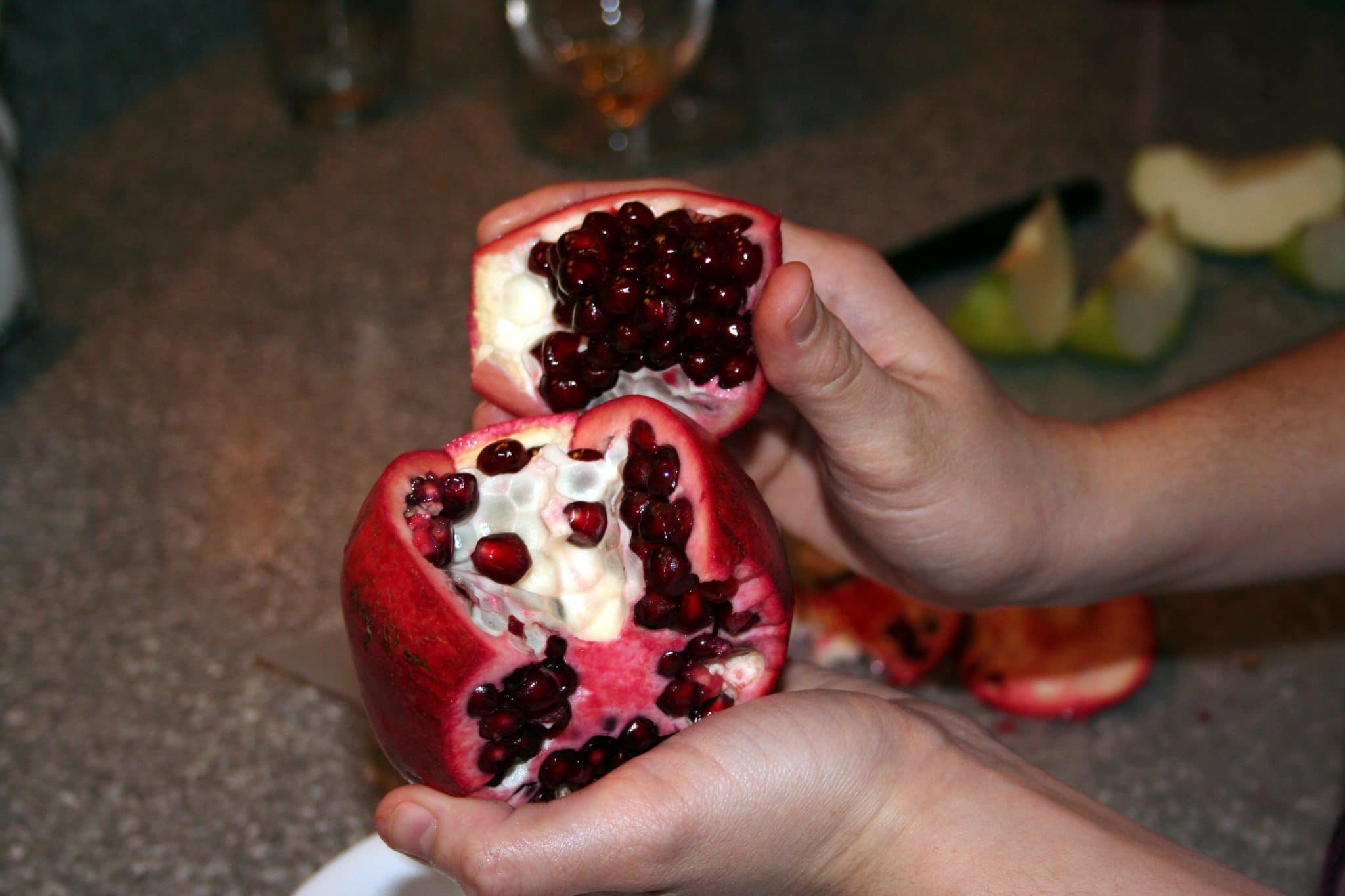 Pomegranate cut in half to show seeds
