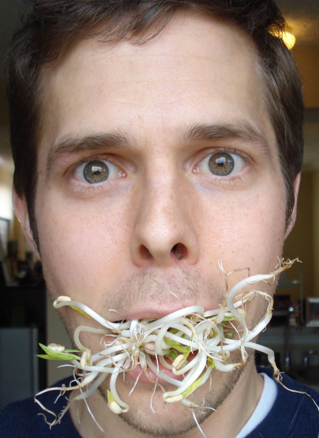 Matt Frazier with mouth full of bean sprouts