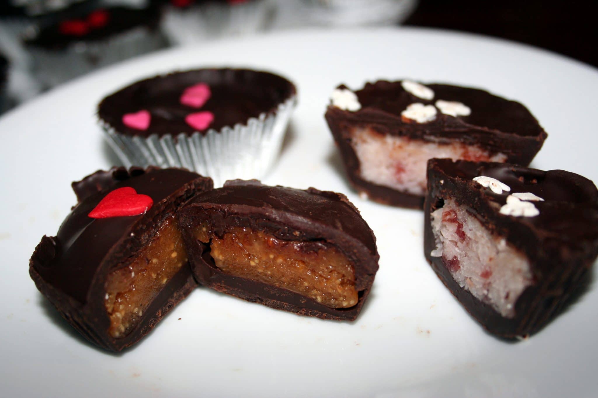 Vegan chocolates cut in half to see filling