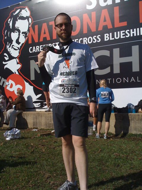 Andy after completing half marathon in throwback NMA shirt