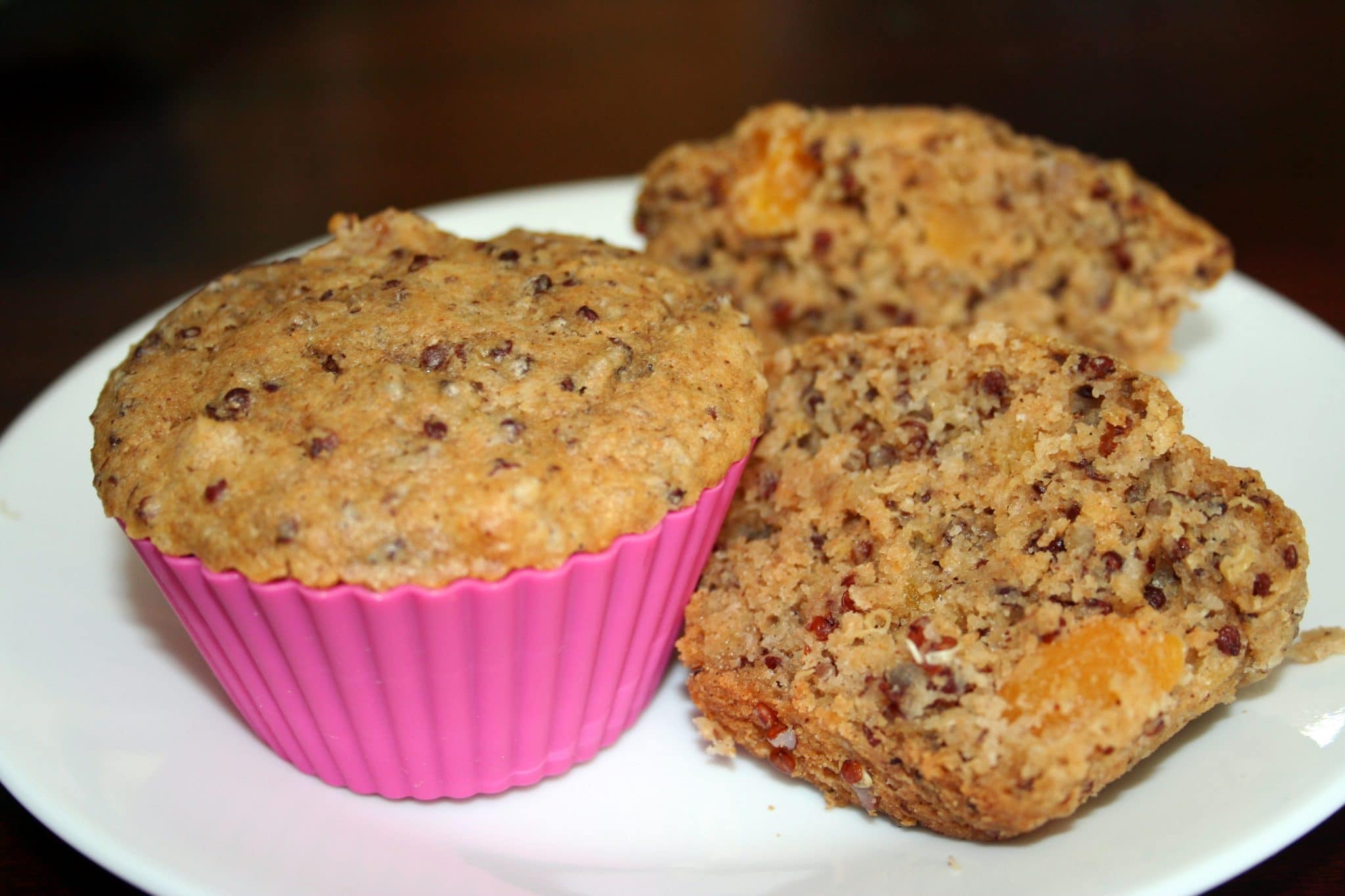 2 vegan almond-quinoa muffins, one cut in half