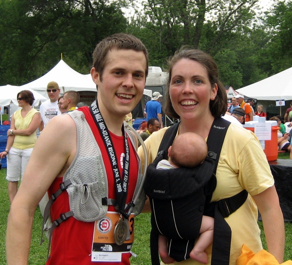 Matt and family after race with medal