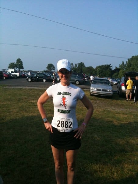 White throwback carrot shirt with race bib