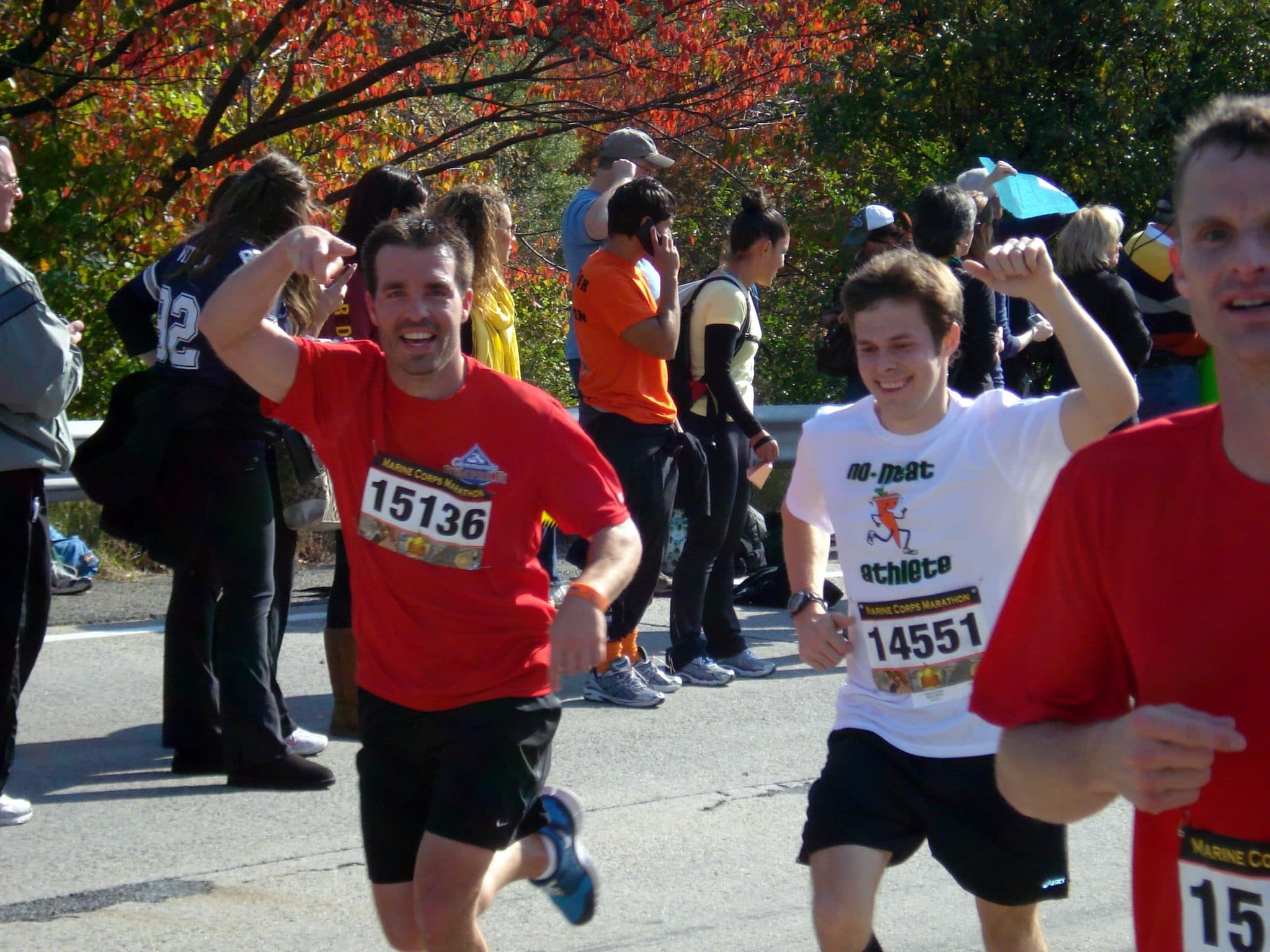 2 men running Marine Corps Marathon 2010
