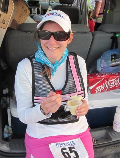 Meredith eating pudding up at aid station during Bad Water Race