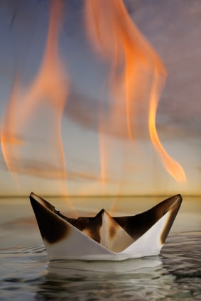 Burning paper boat