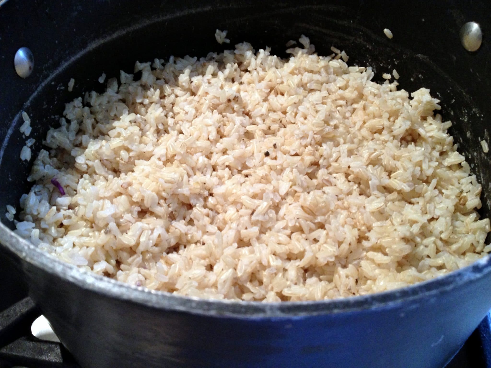 Close up or cooked rice in large pot