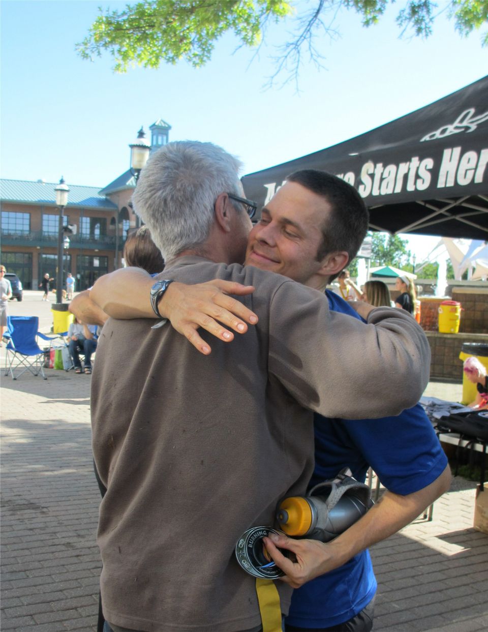 Matt hugging Dad after race