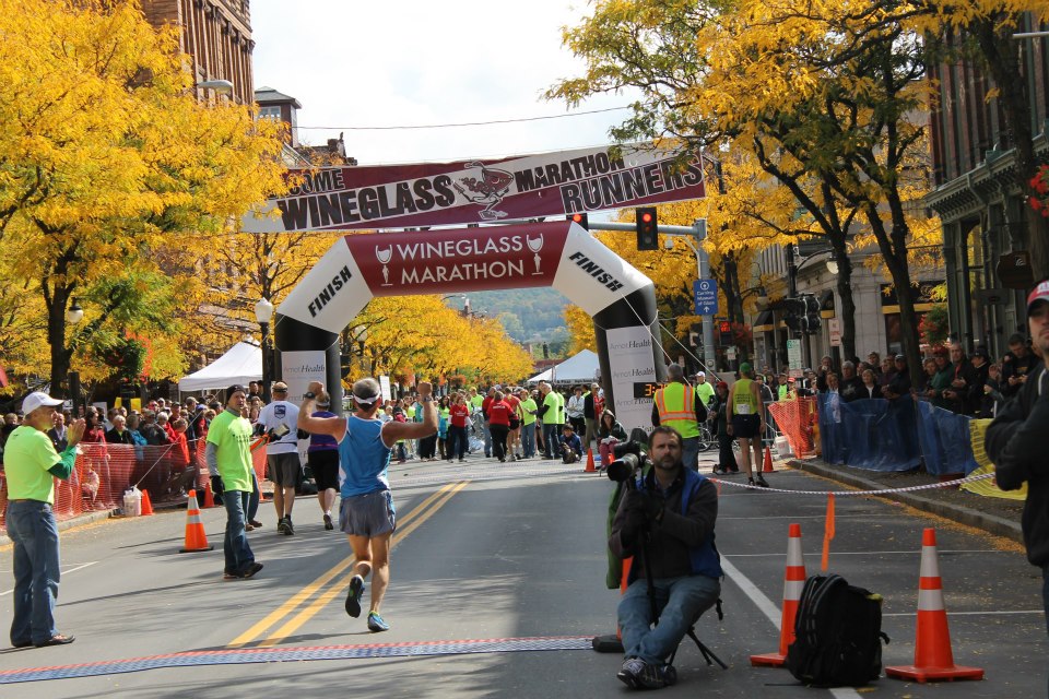 Joe Richardson crossing the finish line to qualify for Boston