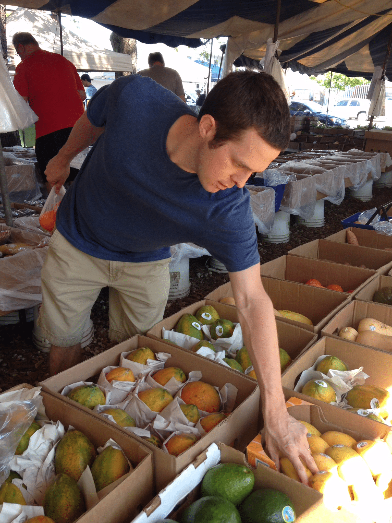 Matt buying fresh fruit in Miami