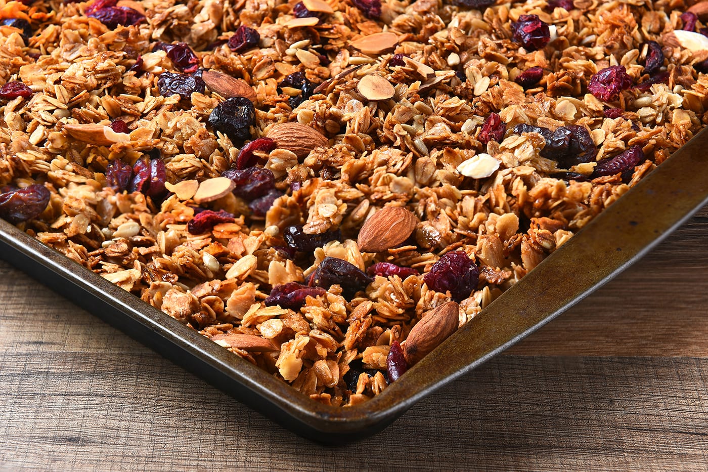 Baking sheet of hot, fresh granola